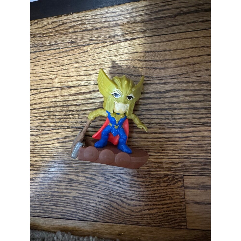 2022 McDonald's Happy Meal toy featuring Golden Armor Thor